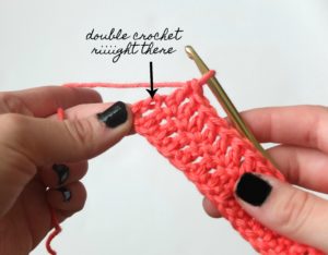 In this photo you will see the beginning of a double crochet tutorial, showing you where exactly to place your last stitch at the end of a row. If the turning chain counts as a stitch, you will put your last double crochet into the top chain of the turning chain from the previous row.