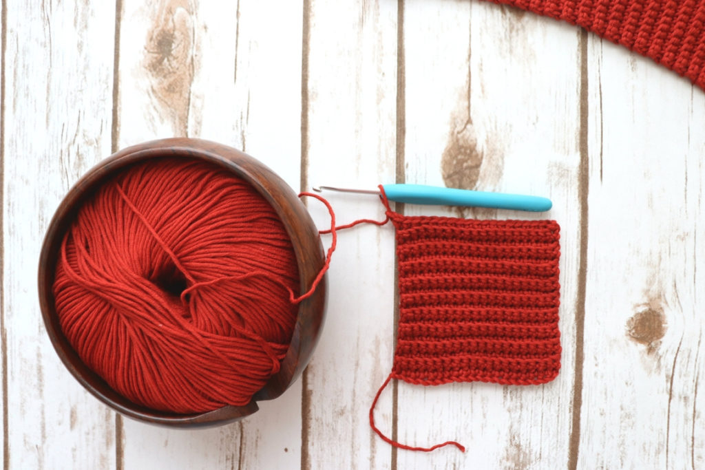 When crocheting with multiple strands of yarn, using a yarn bowl (or multiple yarn bowls) helps so that you don't get your skeins tangled up