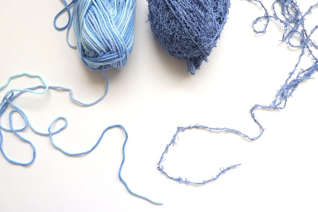 A photo of the yarns used for the Simple Scrubby Dishcloth Crochet Pattern for beginners - Scrubby Smoothie & Scrubby Cotton