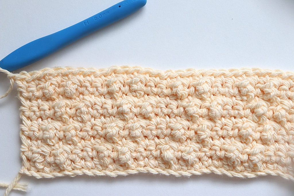 After Rows 8 and 9 are completed of the Treble Pop Washcloth Crochet Pattern - tutorial photo
