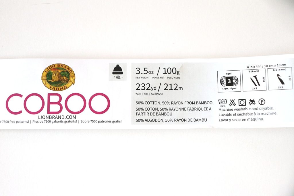 A photo showing the yarn label of Lion Brand Coboo. The yarn label is the key to figuring out How to Choose the Right Yarn for Crochet Beginners 