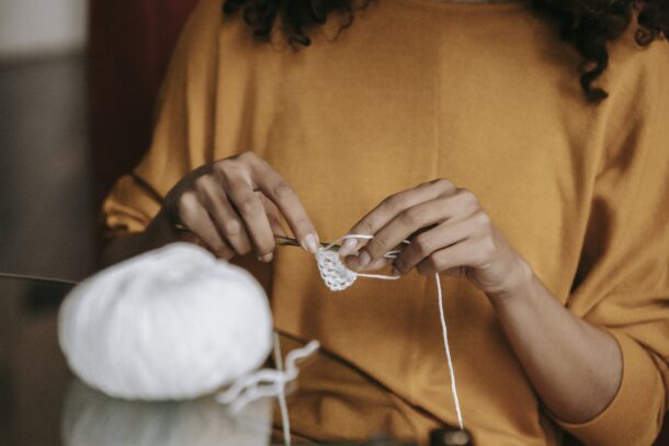 A Person Crocheting